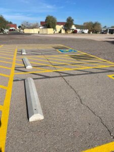 wheel stop installation and painting services Scottsdale.