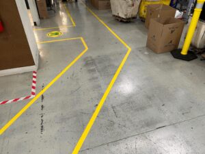 yellow warehouse floor markings meet OSHA requirements
